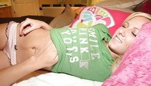 Naughty teenage blondies have some lesbian fun on the bed on clubgf.com