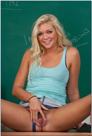 Cute college girl Jessie Andrews stripping in the class and spreading on clubgf.com