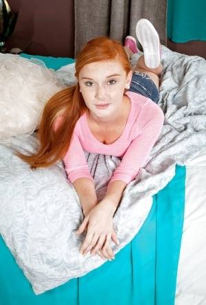 Redheaded babe Alex Tanner toying teen pussy while masturbating on clubgf.com