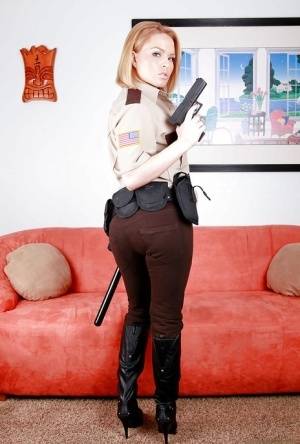 Hot babe in police uniform Krissy Lynn stripping and spreading her legs on clubgf.com