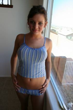 Teen first timer Kate Crush strips naked in front of a window with no curtains on clubgf.com