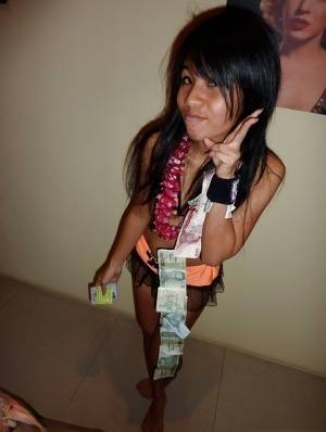 Petite Thai bar girl showing off her shaved pussy for money - Thailand on clubgf.com