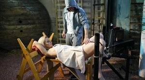 Restrained blonde Roxy Lee is penetrated by a machine dildo on clubgf.com