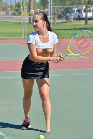 Teen tennis player inserts her racquet handle into her horny twat on clubgf.com
