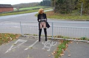 Mature redhead Barby Slut exposes herself in public while wearing OTK boots on clubgf.com