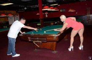 Curvy slut gets nailed on a pool table and jizzed over her big jugs on clubgf.com