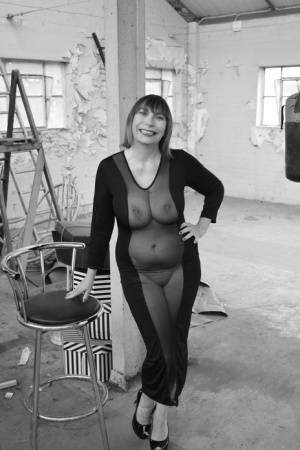 Middle-aged woman Barby Slut models a see-thru dress for a black-and-white gig on clubgf.com