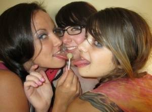 Three coeds in pigtails decide to give sleeping guy a hot handjob topless on clubgf.com