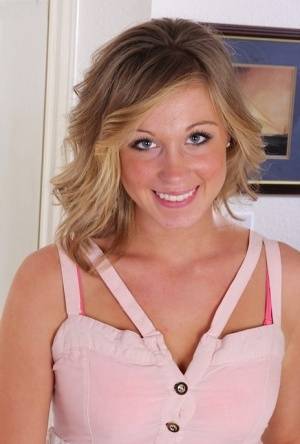Smiling coed Ashley Jones gets naked for the very first time on clubgf.com