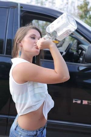 Teen slut Abby Cross empties a whiskey bottle before getting banged on clubgf.com