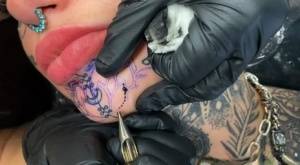Tattoo enthusiast Amber Luke gets a new face tat from a female artist on clubgf.com