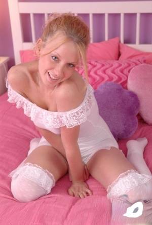 Young blonde girl Lucky parks her pussy on top of a plush toy on clubgf.com