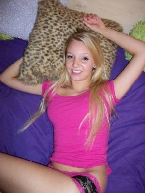 Cute teen girl with blonde hair shows off her tits and twat for the first time on clubgf.com