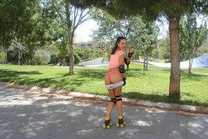 Latina solo girl Carolina Abril shedding shorts to expose nice ass outdoors on clubgf.com