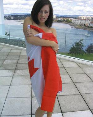Teen amateur Kate wraps her naked body up in a Canadian flag on clubgf.com
