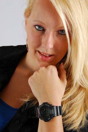 Blue-eyed blonde Britt displays her black G-Shock during non-nude action on clubgf.com
