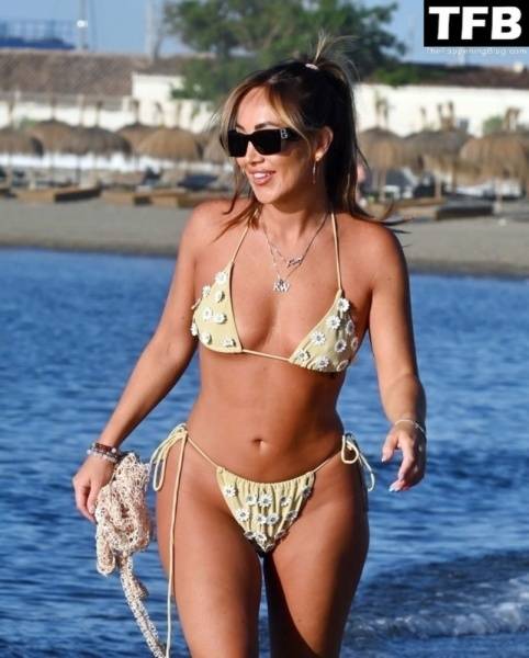 Lauryn Goodman Shows Off Her Sexy Bikini Body on the Beach in Marbella on clubgf.com