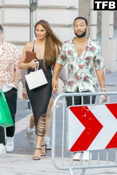 Chrissy Teigen Goes Braless Under a Very Sexy Sheer Black Dress in France - France on clubgf.com