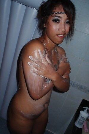 Tattooed Thai girl Ploy caught wet and naked in the shower - Thailand on clubgf.com
